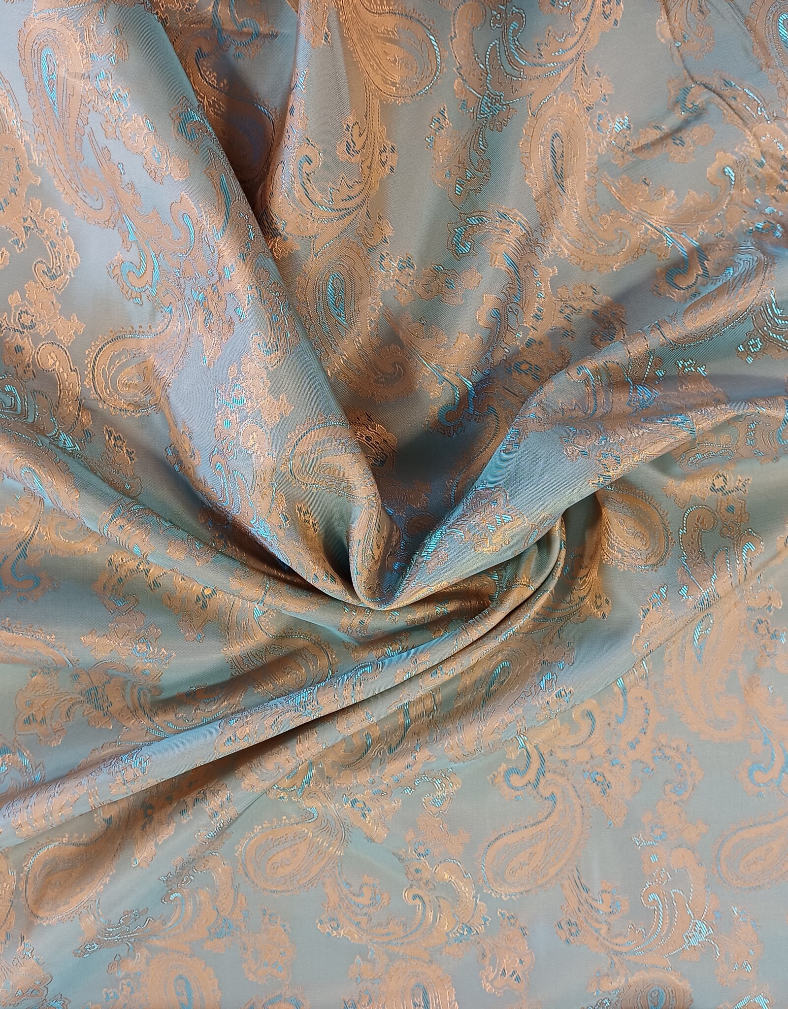 Stoffenschuur selectie Voering bedrukt paisley turquoise, goud