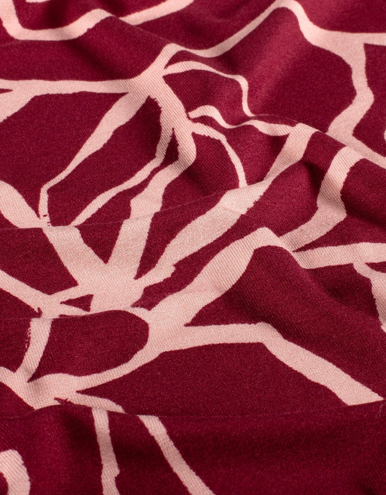 Viscose jersey two-tone abstract roses bordeau