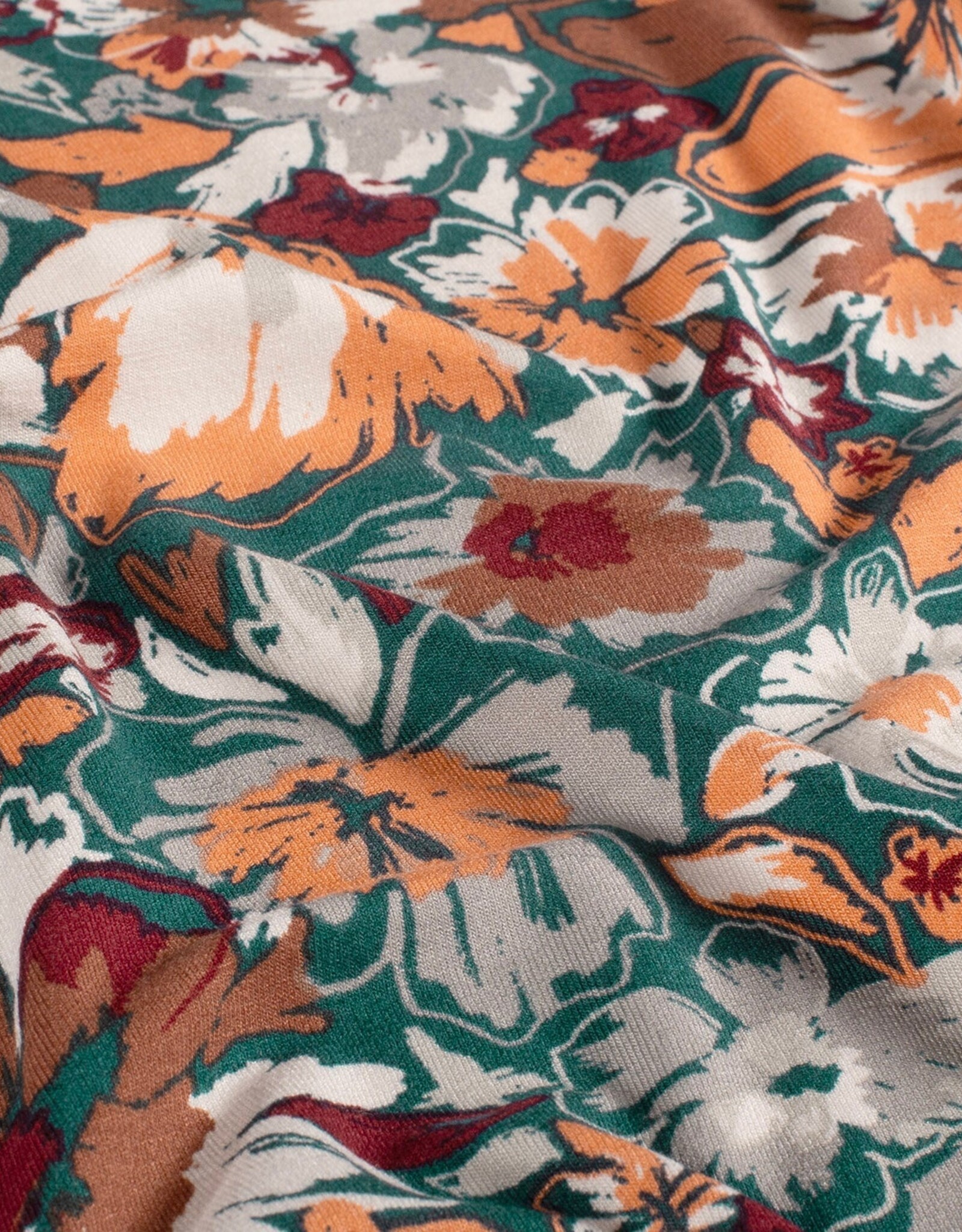 Viscose jersey gebloemd petrol bordeau bruin