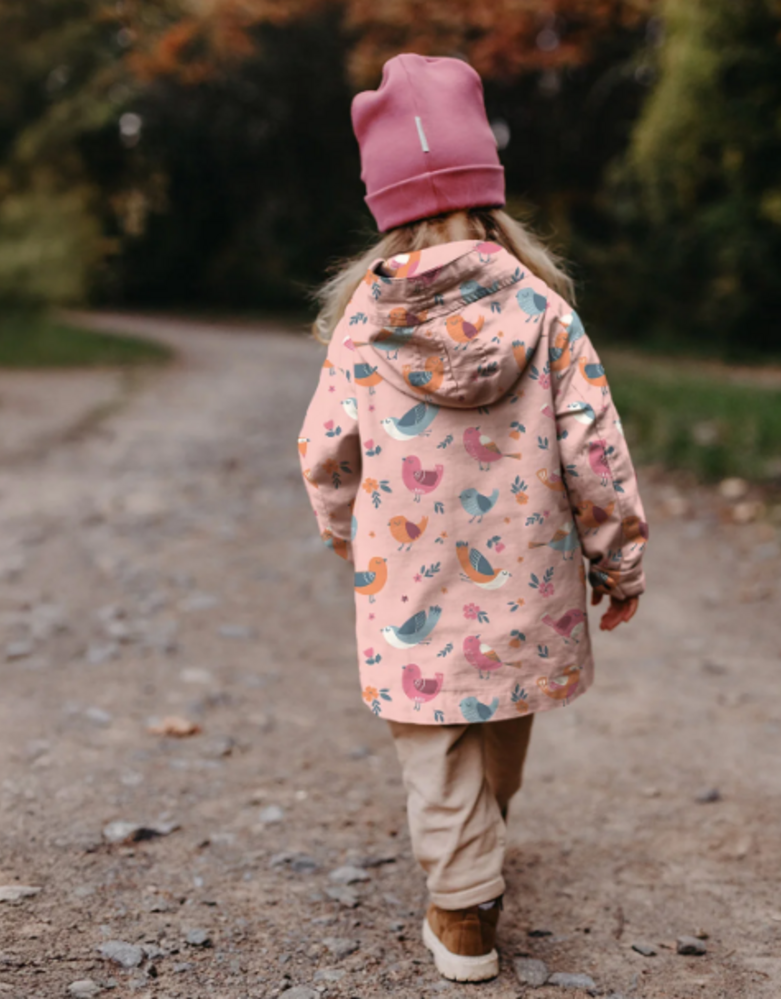 Gecoate regenjassenstof rose vogeltjes birds