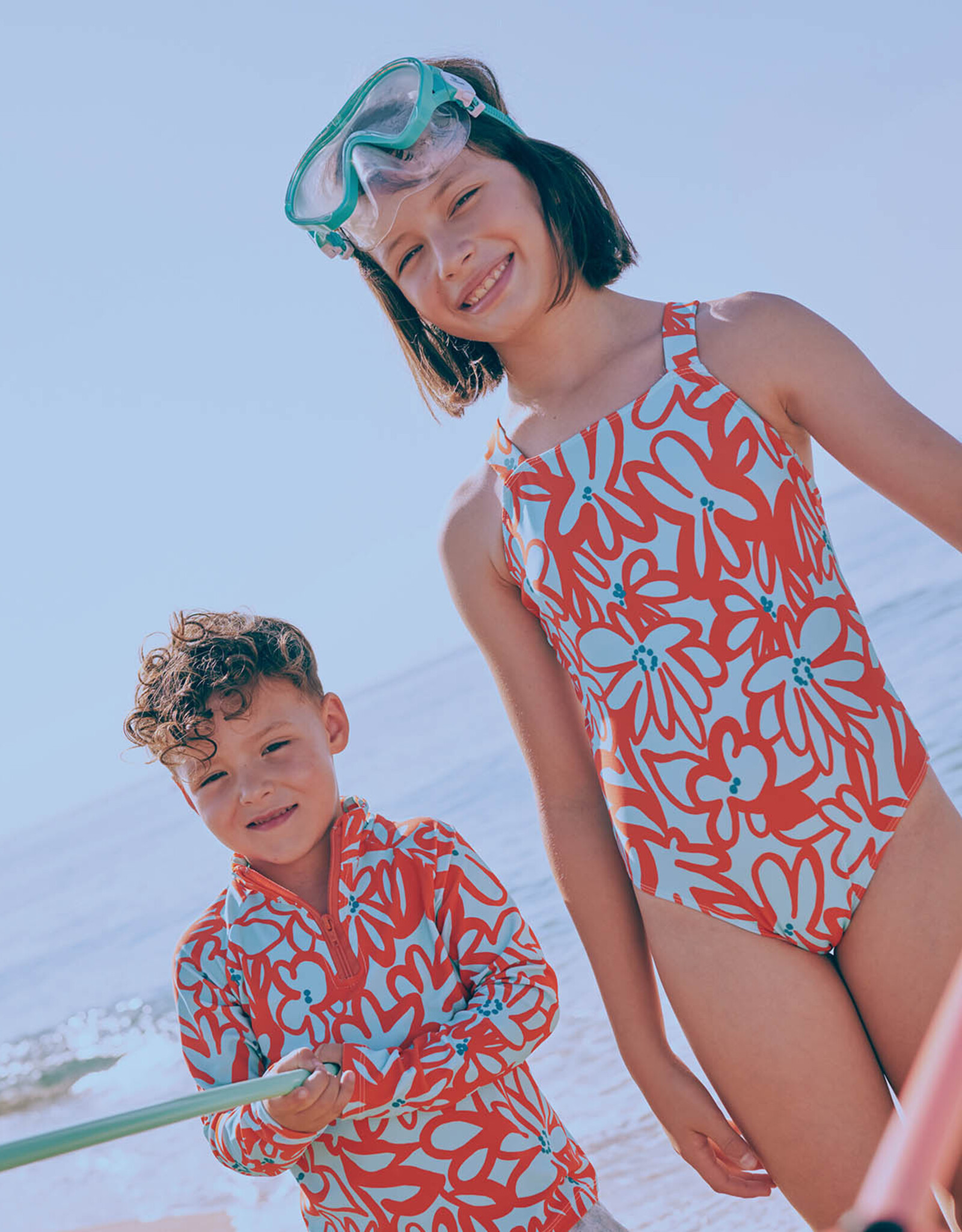 Lycra badpakkenstof retro oranje bloemen