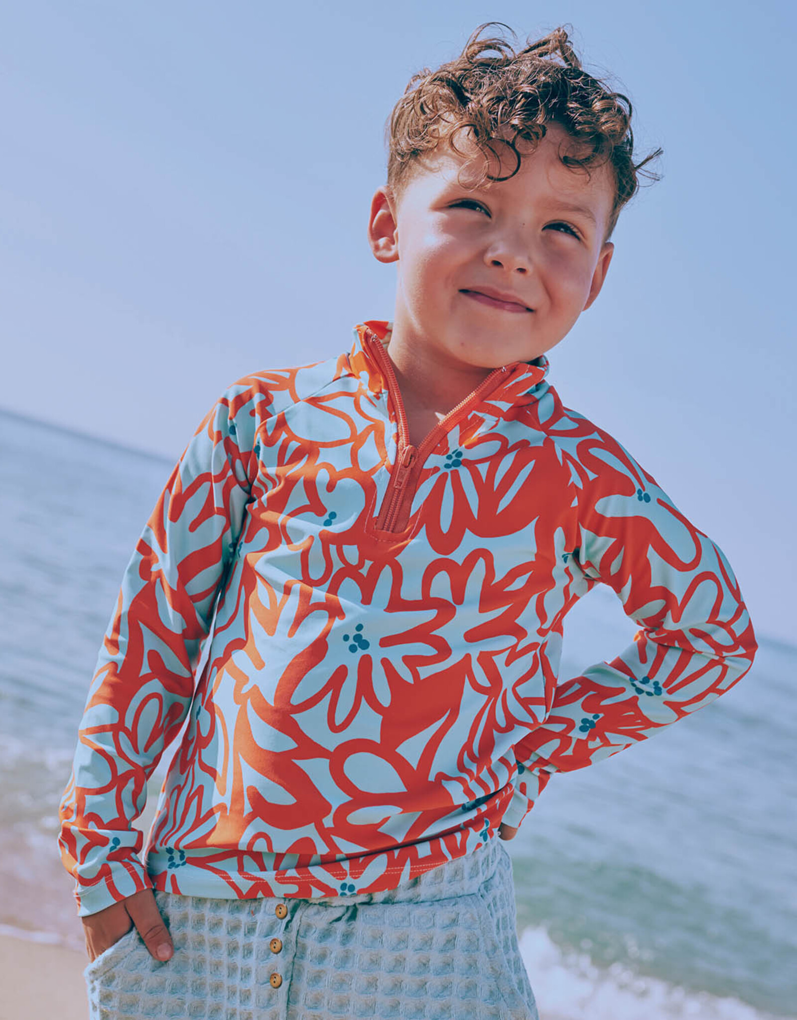 Lycra badpakkenstof retro oranje bloemen