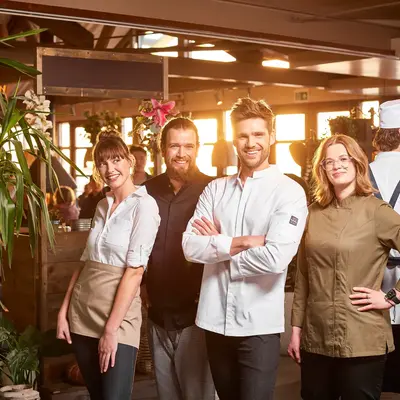 Waar kan ik trendy bedrijfskleding kopen voor mijn team? 