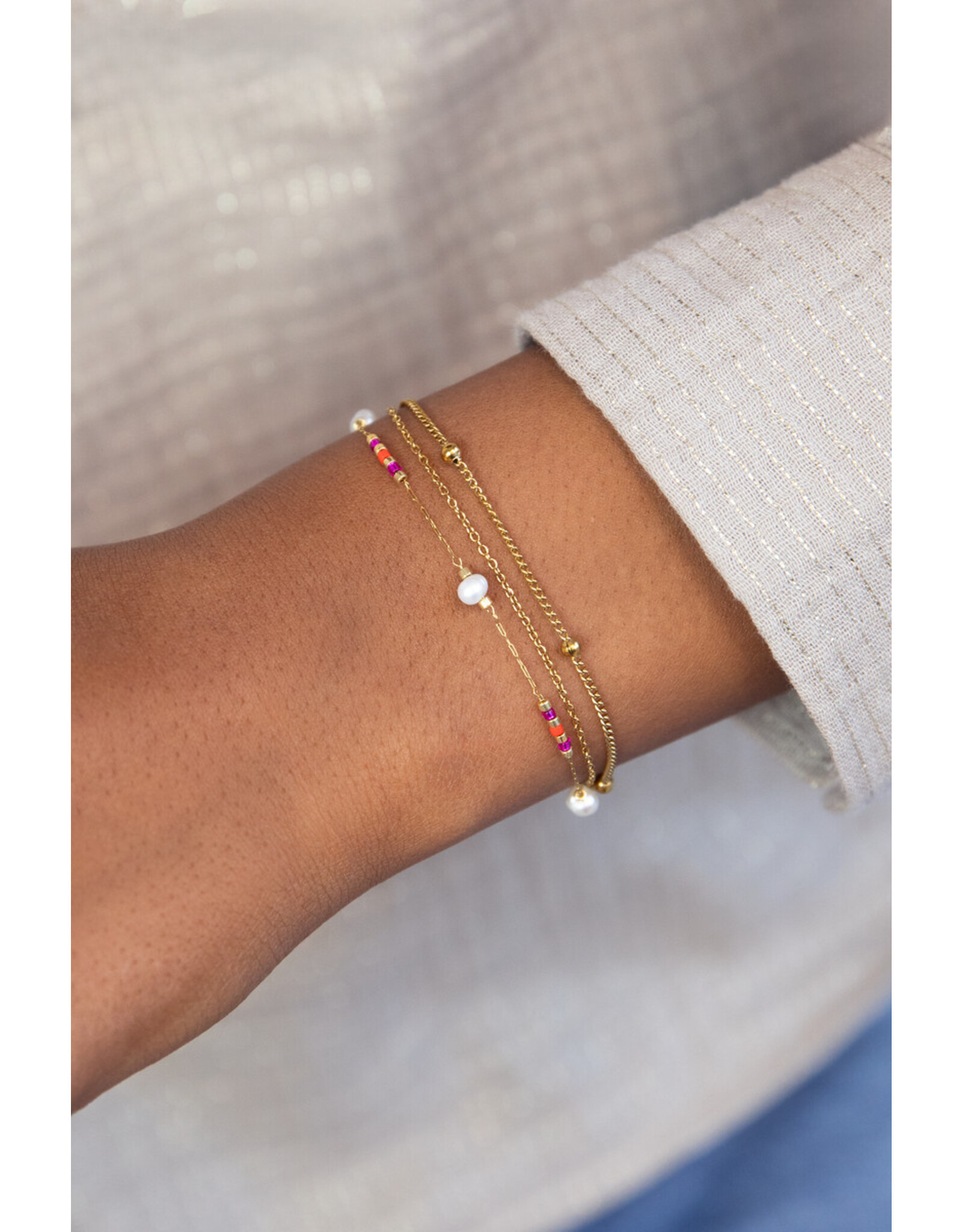 Armband driedubbel parels en kralen