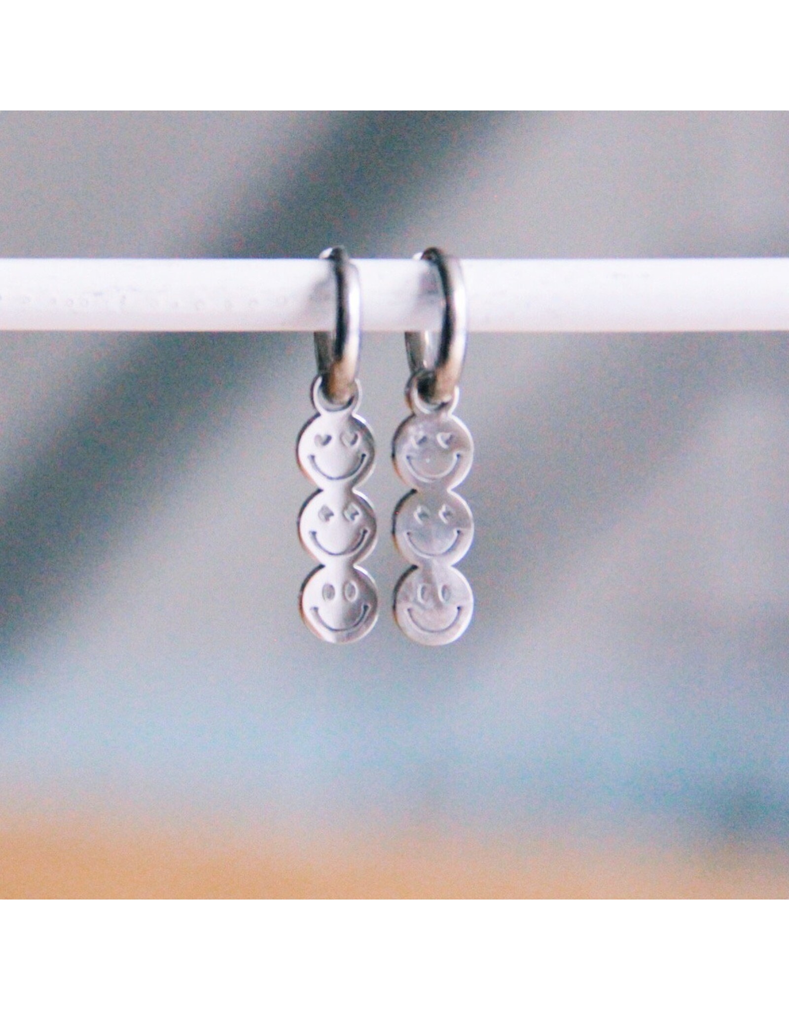 Oorringen 3 smileys zilver