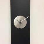 Klokkendiscounter Design - Wall clock Black -Line Silver Eye Modern Design Stainless steel