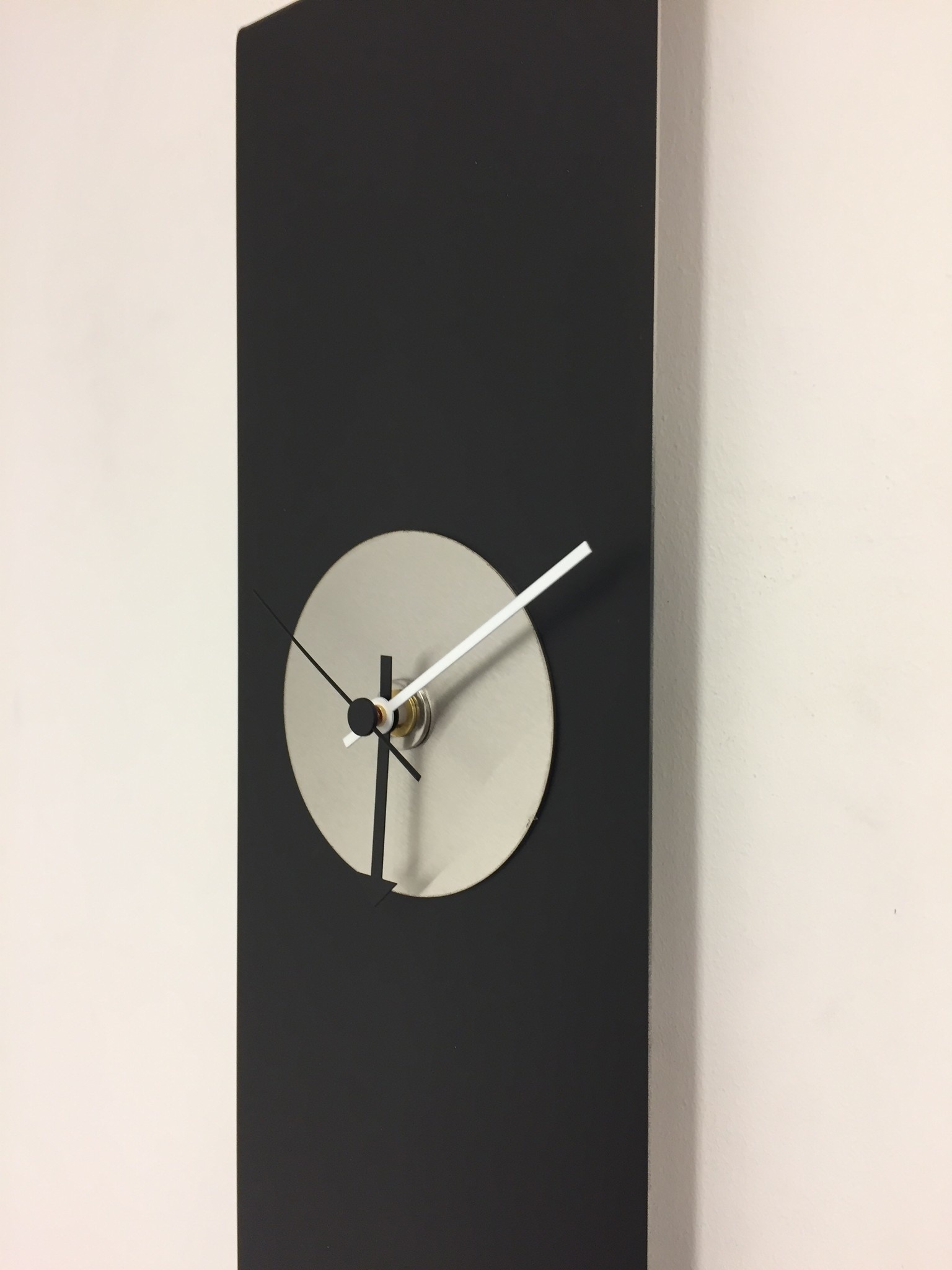 Klokkendiscounter Design - Wall clock Black -Line Silver Eye Modern Design Stainless steel