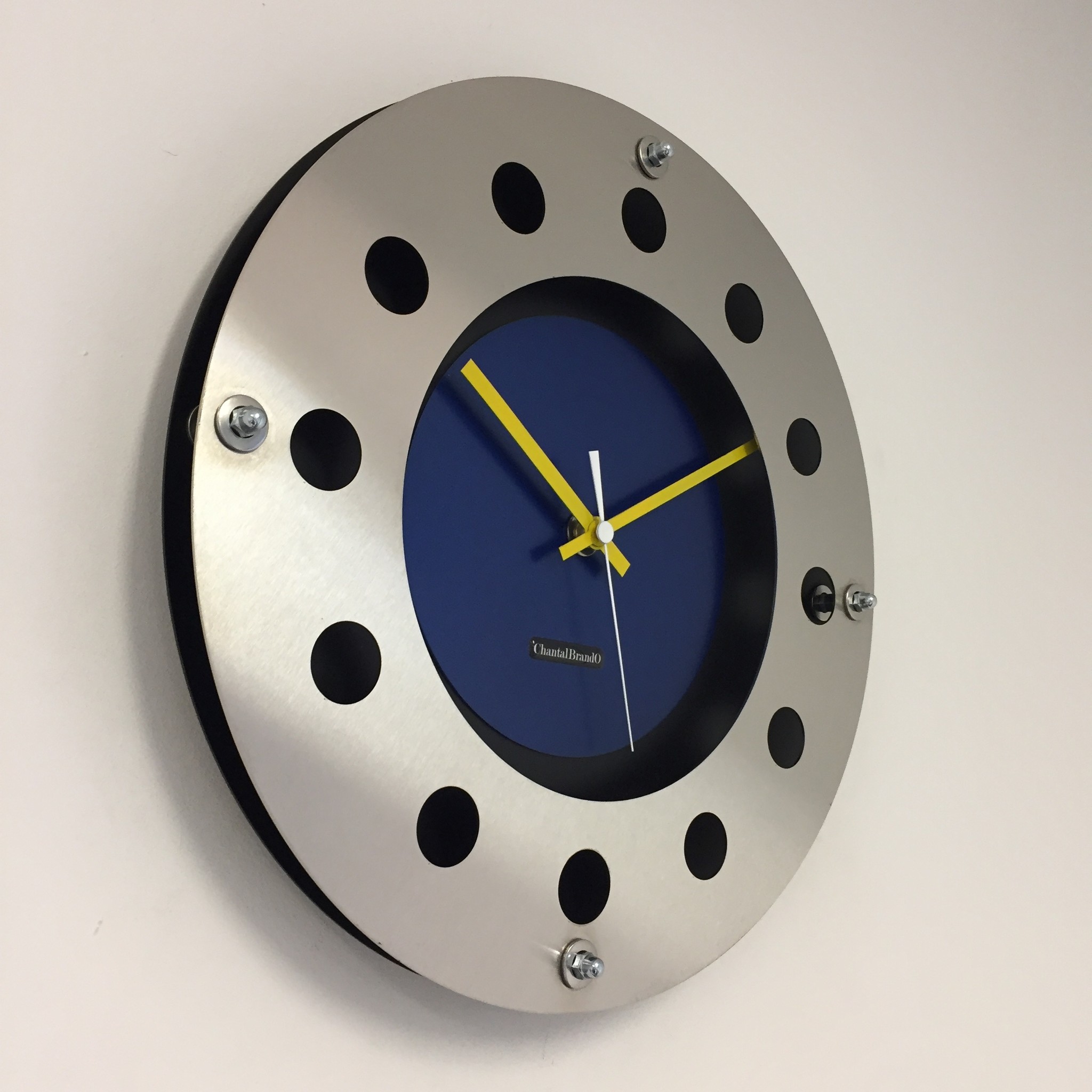 ChantalBrandO Design - wall clock mecanica full black with blue color small indoor circle yellow white pointer modern Dutch design handmade 40 cm