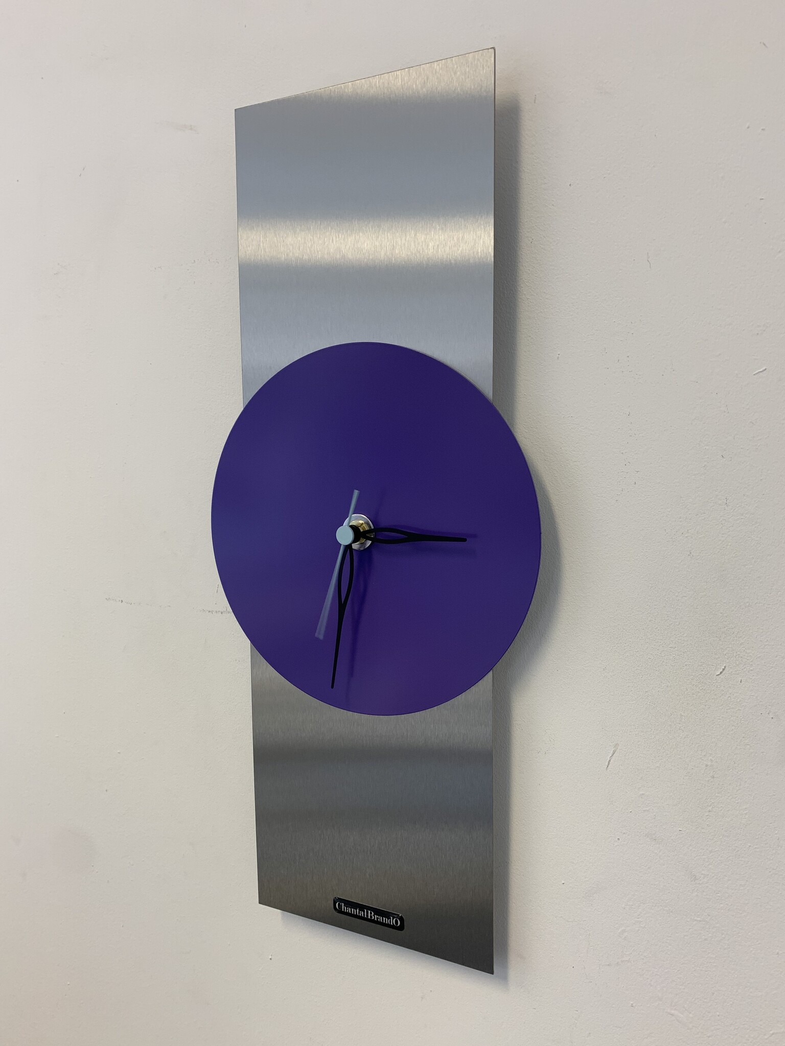 Klokkendiscounter Design - Wall clock stainless steel Purple Haze