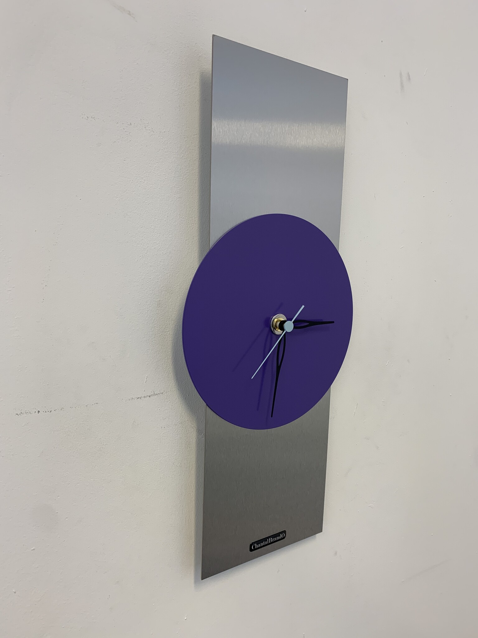 Klokkendiscounter Design - Wall clock stainless steel Purple Haze