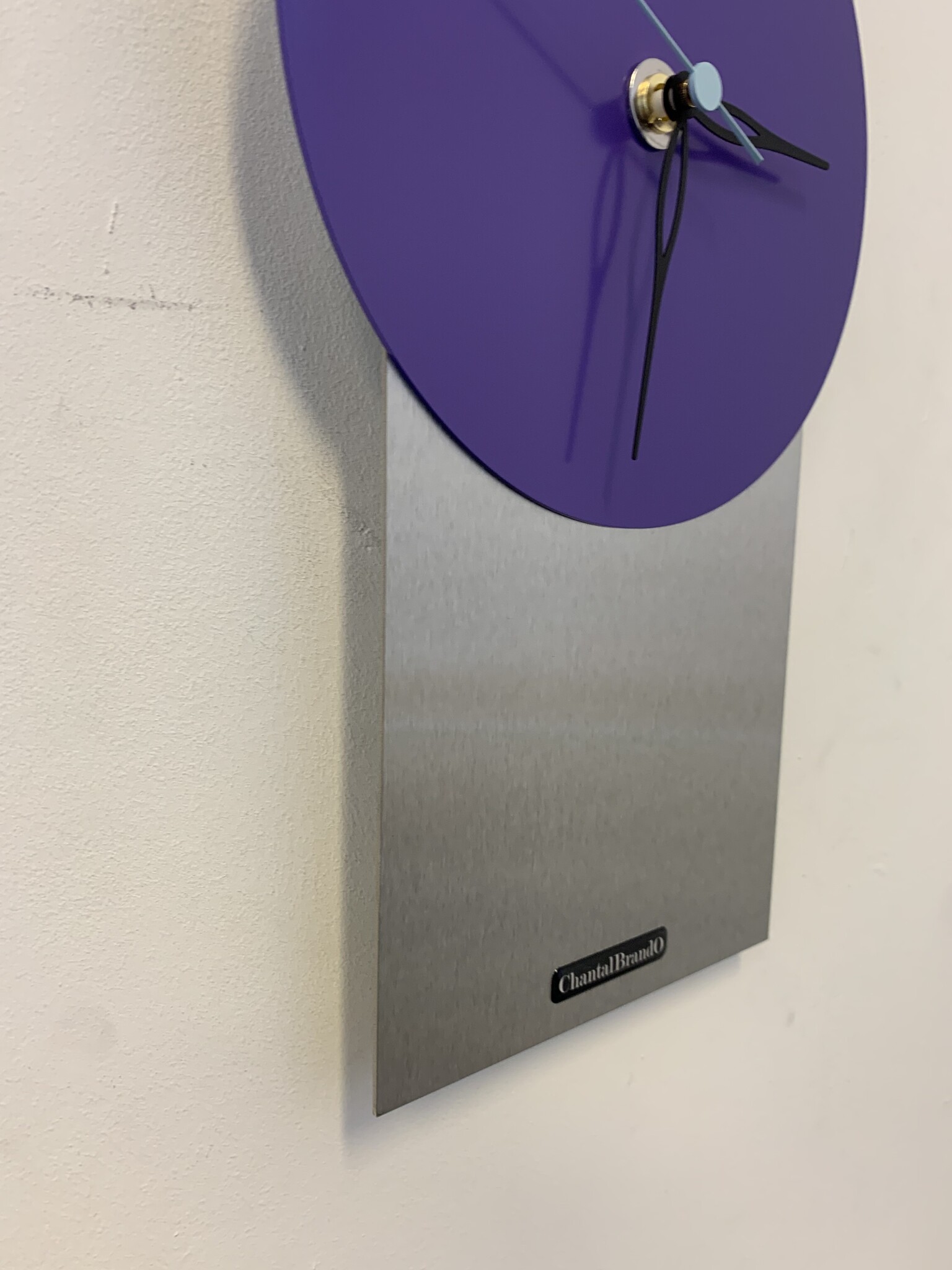 Klokkendiscounter Design - Wall clock stainless steel Purple Haze