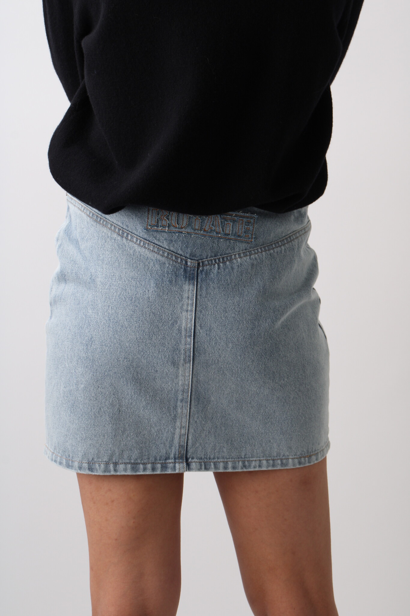 Rotate Denim Laced Mini Skirt