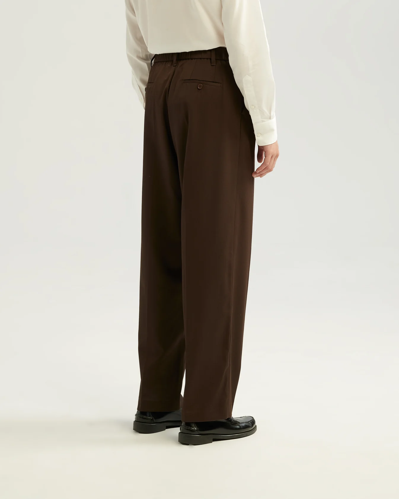 ANGE PROJECTS Pleated Trousers