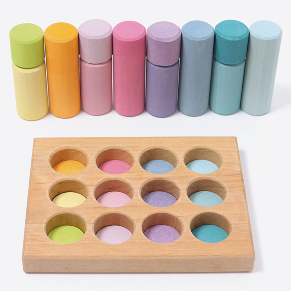 Grimm's Stapel- en sorteerspel pastel rollers in sorteerbord Grimm's Stapel- en sorteerspel pastel rollers in sorteerbord