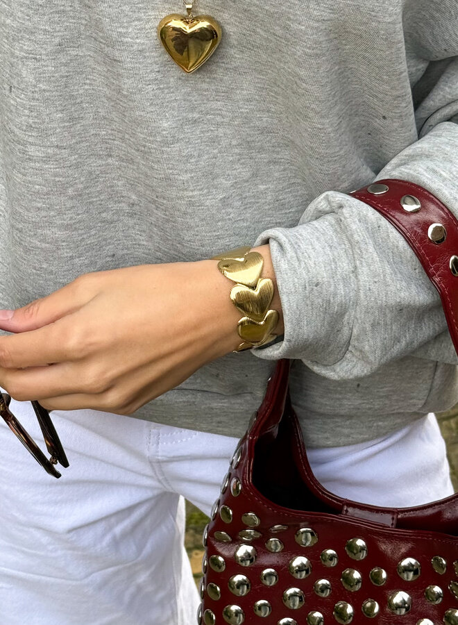 Embrace armband gold