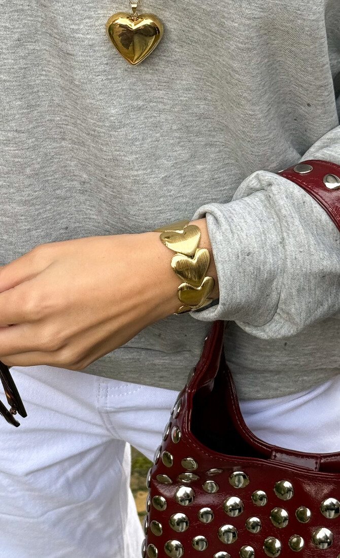 Embrace armband gold