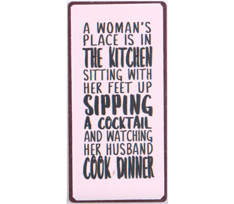 A woman's place is in the kitchen, sitting with her feet up,  sipping a cocktail and watching her husband cook dinner