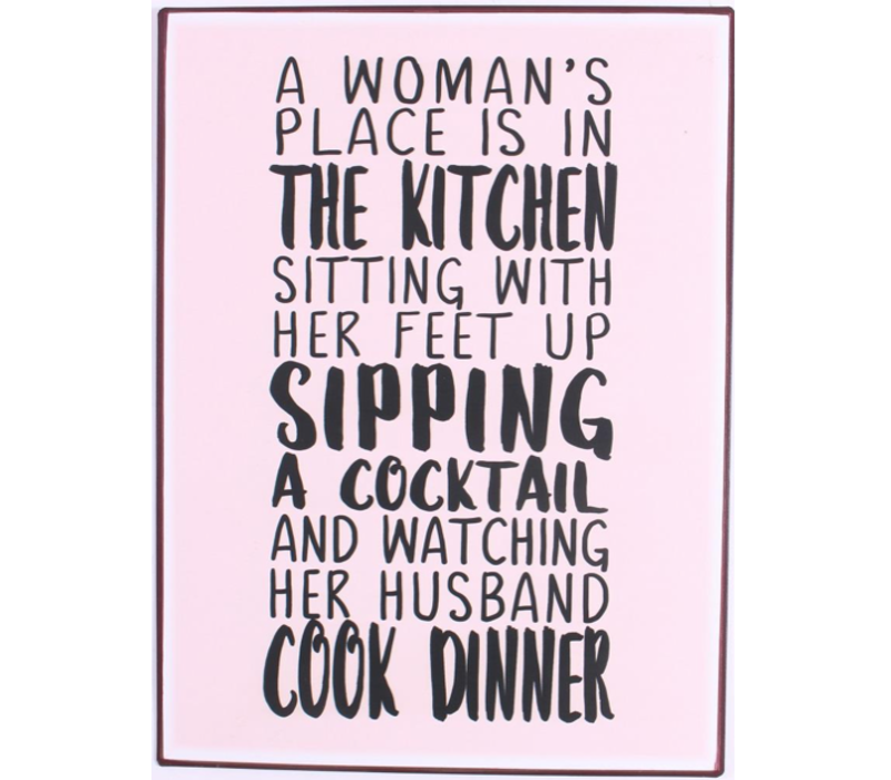 A woman's place is in the kitchen, sitting with her feet up,  sipping a cocktail and watching her husband cook dinner