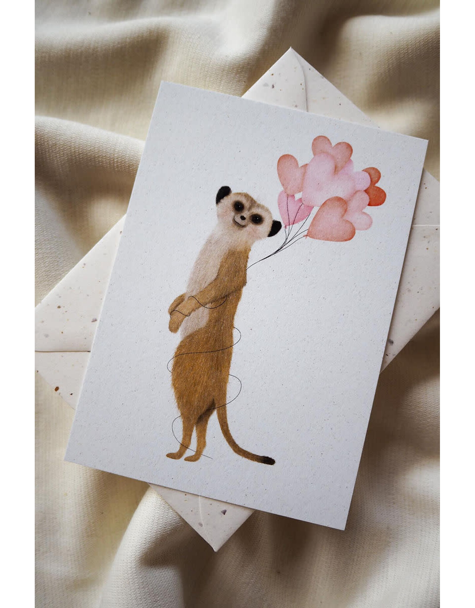 getekenddoorzusje Wenskaart - Stokstaartje met Hartjes - Postkaart + Envelop