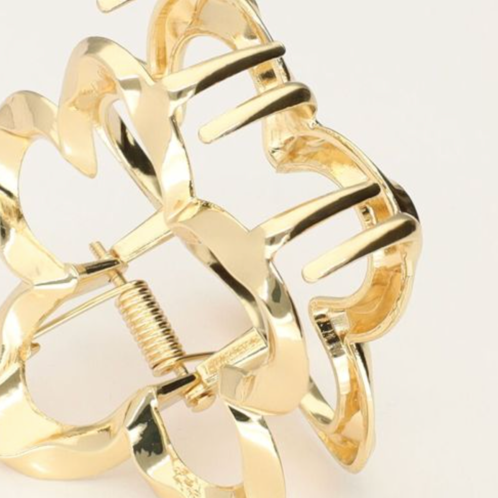 MY JEWELLERY MY JEWELLERY - Goudkleurige bloem haarclip gedraaid