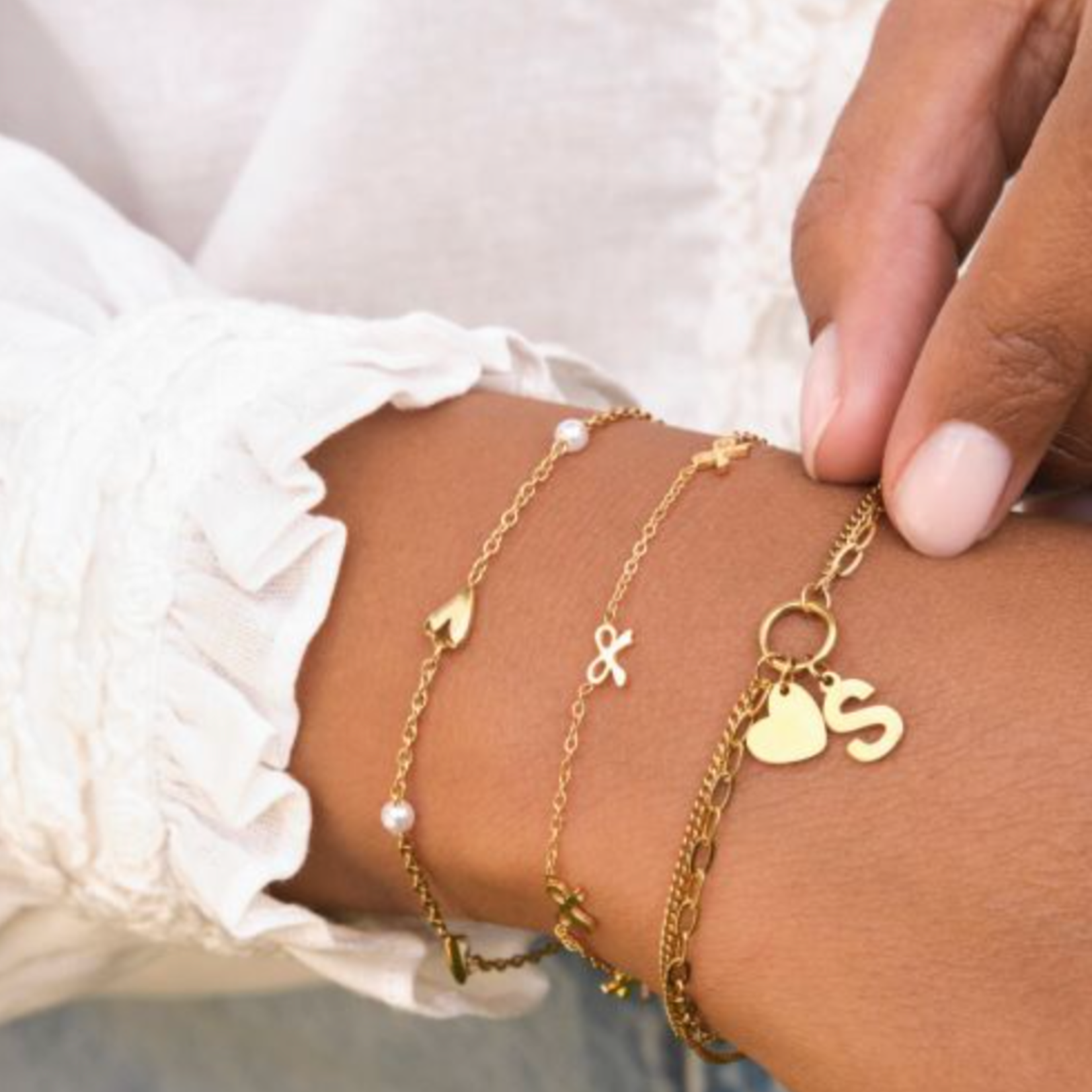 MY JEWELLERY MY JEWELLERY - Armband met hartjes en imitatieparels goud