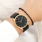 OOZOO OOZOO - Goudkleurig  horloge met zwarte leren band ø 40mm