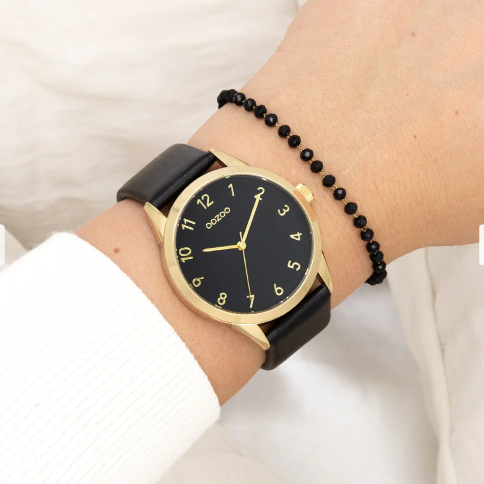 OOZOO OOZOO - Goudkleurig  horloge met zwarte leren band ø 40mm