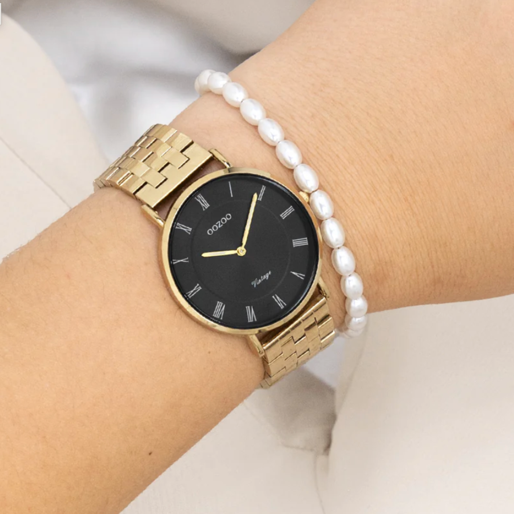 OOZOO OOZOO - Goudkleurig  horloge met roestvrijstalen band ø36mm