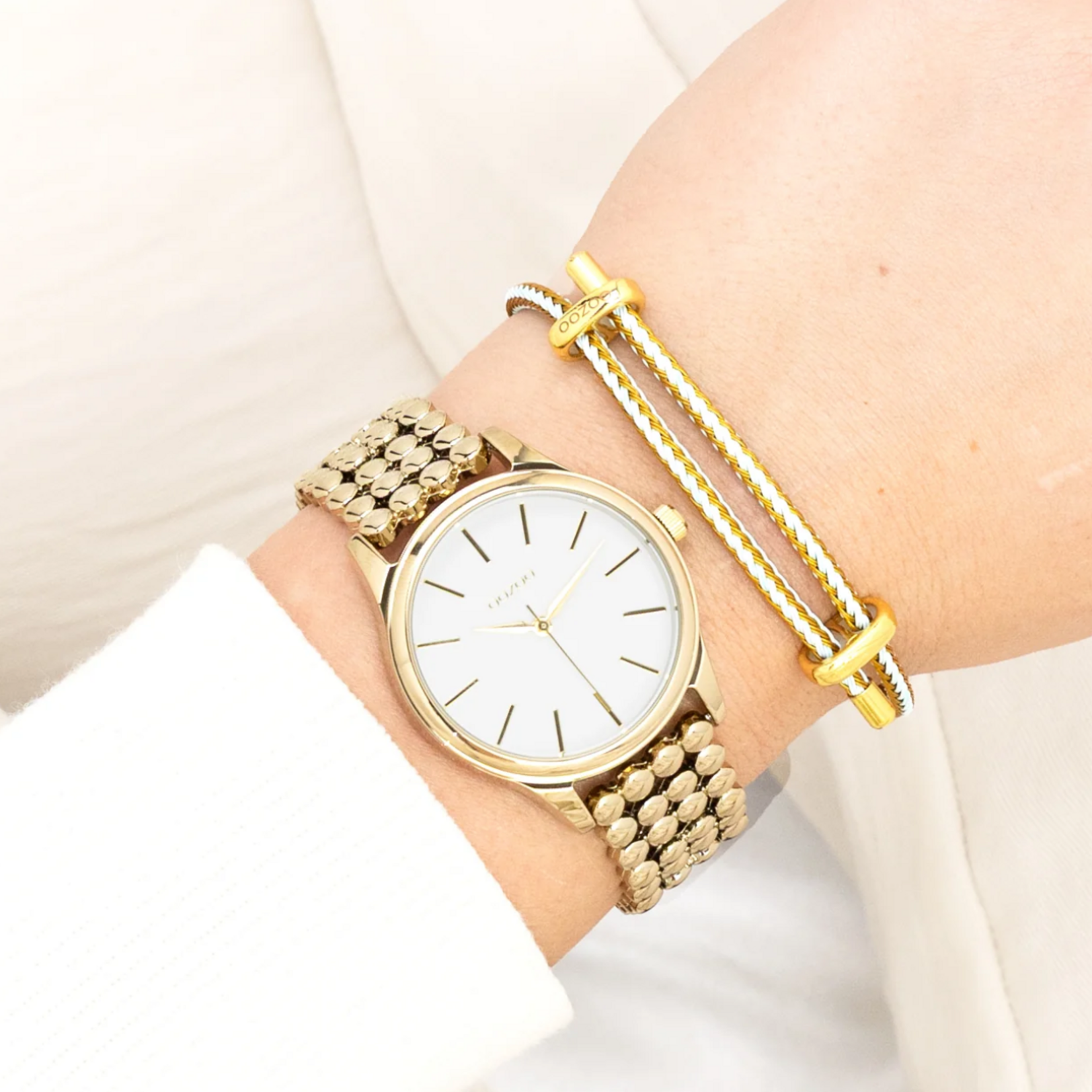 OOZOO OOZOO - Horloge goudkleurig met bolletjes schakelarmband  C11671