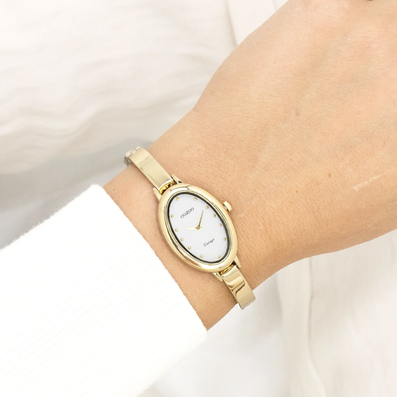 OOZOO OOZOO - Goudkleurig OOZOO horloge met bangle - C20462