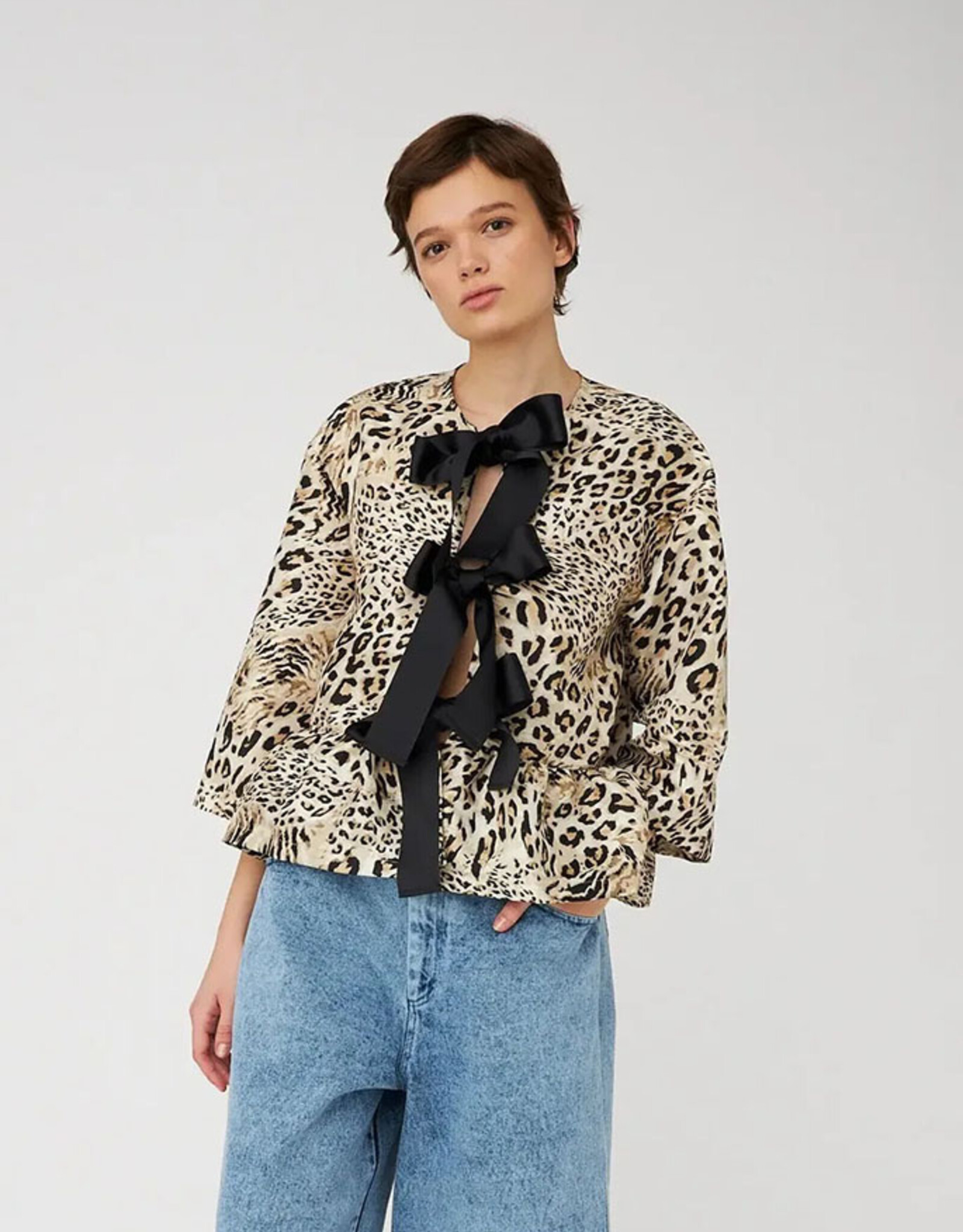 STELLA NOVA CRISPY PEPLUM BOW BLOUSE - LEOPARD