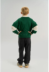 The New Virgil Polo Sweatshirt June Bug