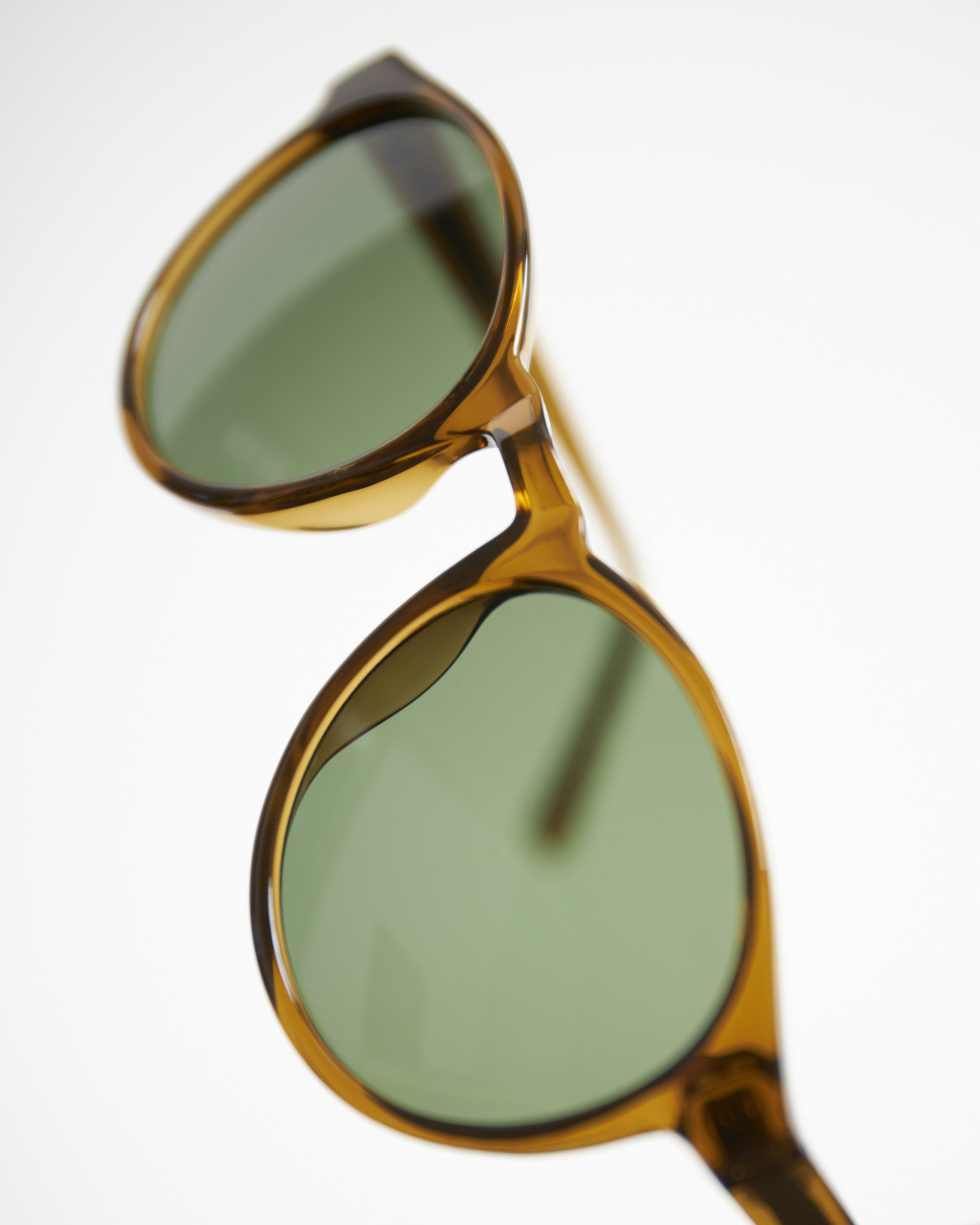A.Kjaerbede Marvin Round Sunglasses in Green Marble Transparent