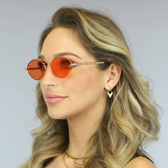 Goldfarbene Vintage-Sonnenbrille mit orangefarbenen Gläsern