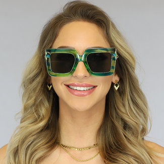 Große grüne Retro-Sonnenbrille mit Schalterbeinen