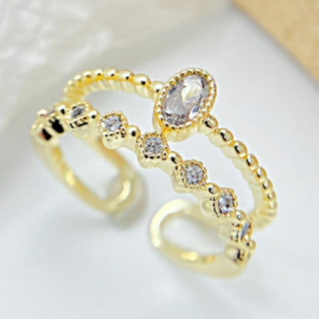 Gold-Doppelring mit Strass-Steinen