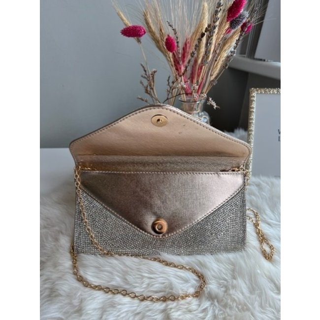 Roségoldfarbene, strassbesetzte Clutch