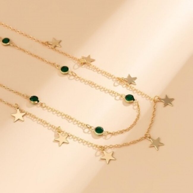 Goldene Hüftkette mit Sternen und grünen Steinen