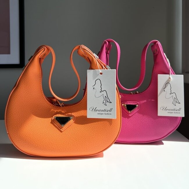 Runde Tasche in Fuchsia-Lederoptik