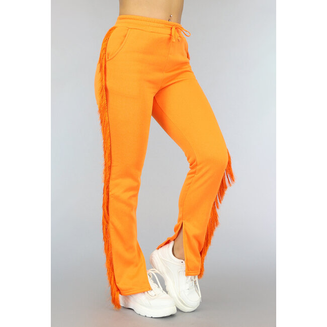 Orangefarbene Sweatpants mit Fransen