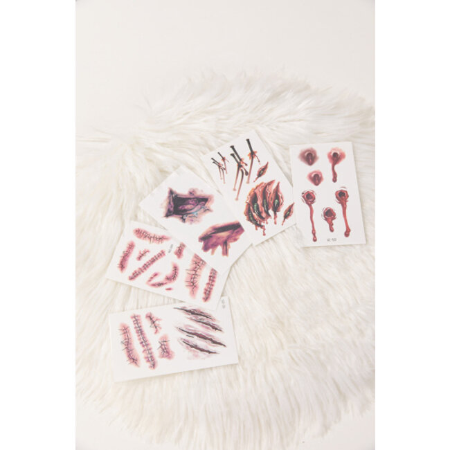 Temporäre Tätowierung von blutigen Wunden