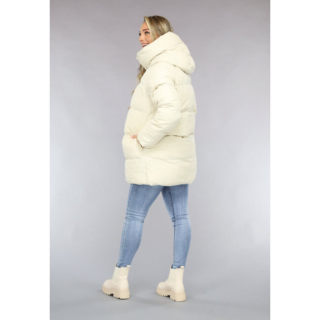 Beigefarbene Pufferjacke mit abzippbarer Kapuze