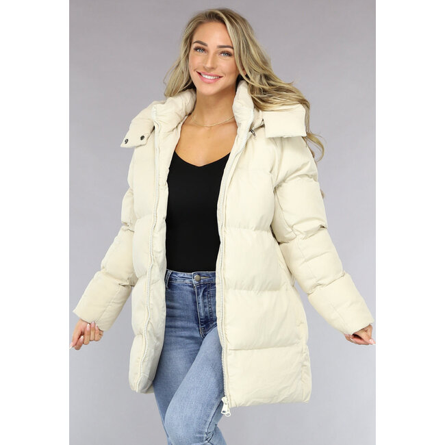 Beigefarbene Pufferjacke mit abzippbarer Kapuze