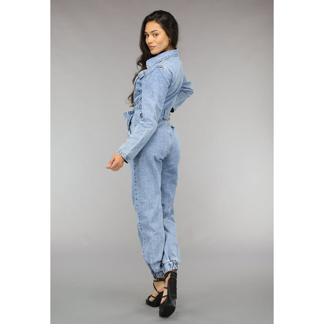 Blauer langärmeliger Jeans-Overall mit Bund