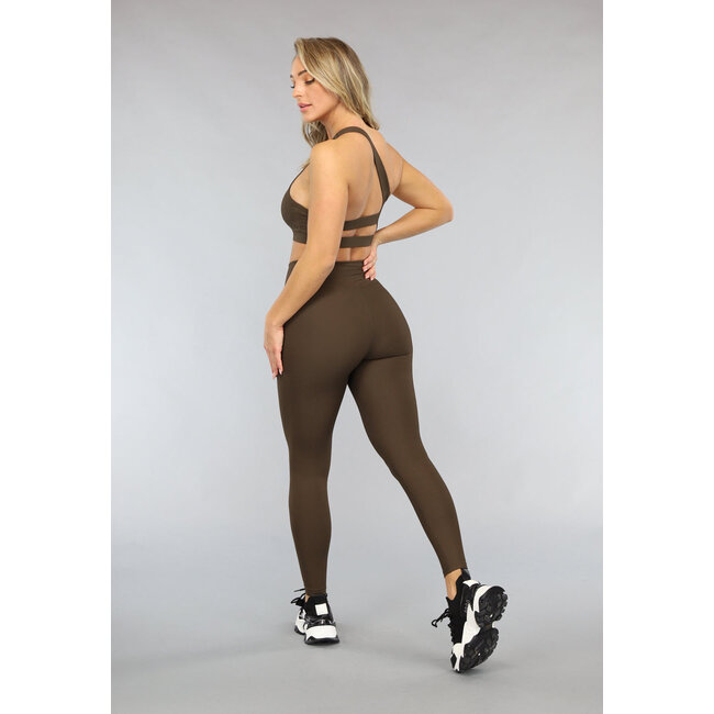 Dunkelbraune dehnbare Sport-Leggings mit taillierter Passform