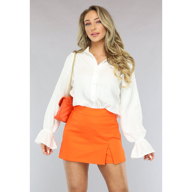 Orangefarbener, taillierter Skort mit Schlitz