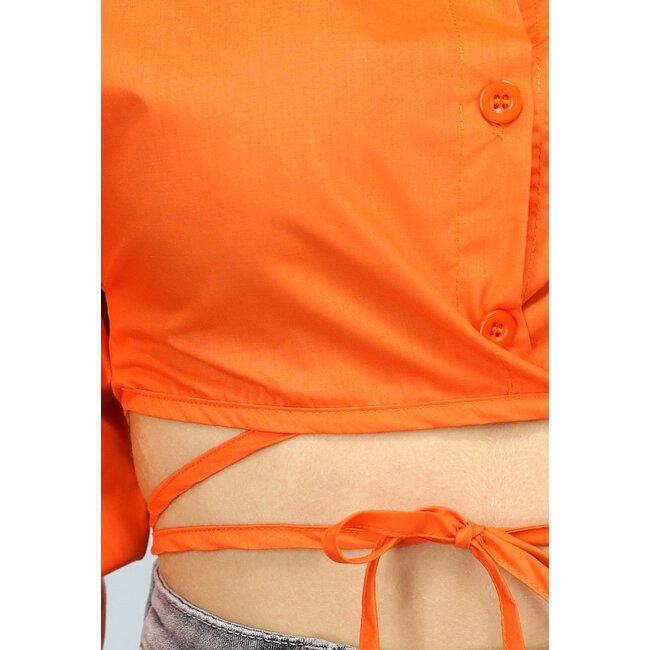 Orangefarbene Bluse mit Riemchendetails