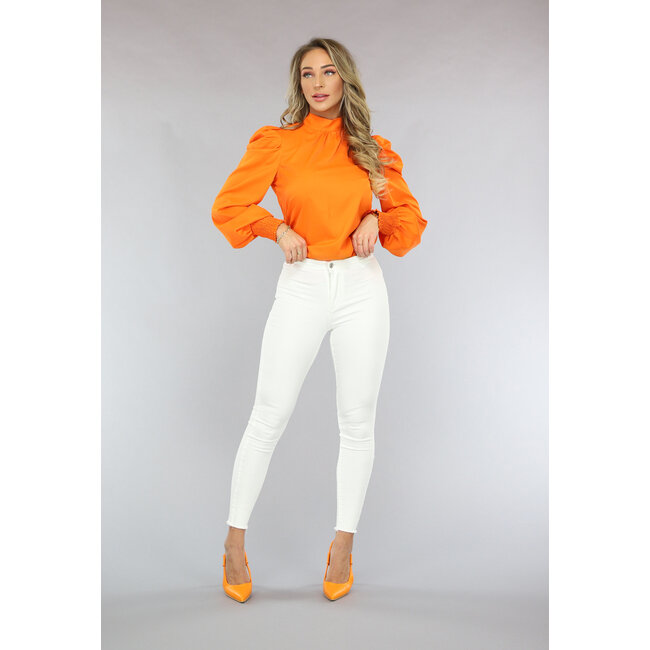 Orangefarbene Bluse mit Puffärmeln und Schleifendetail