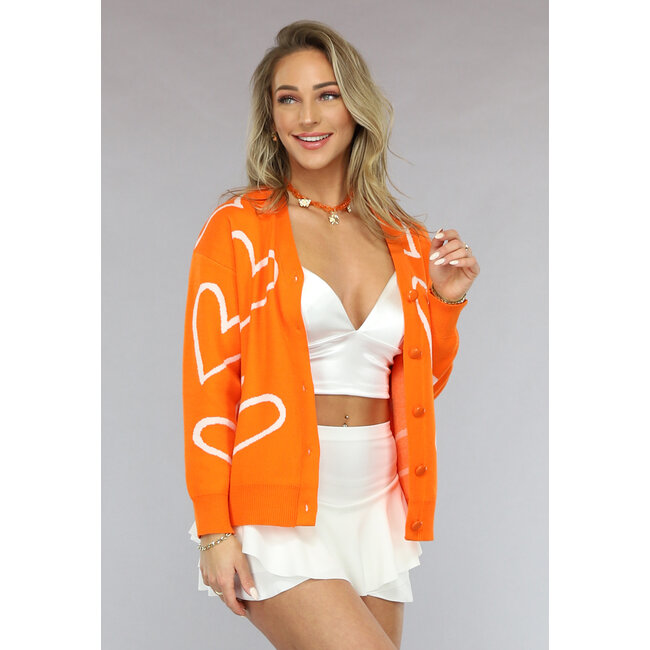 Orangefarbene Strickjacke mit Knöpfen und Herzchenaufdruck