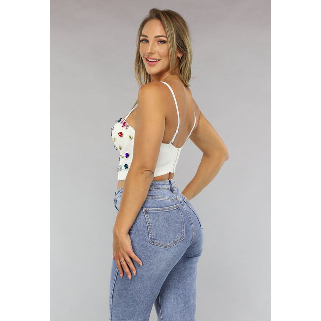 Weißes Bustier mit großen mehrfarbigen Strasssteinen